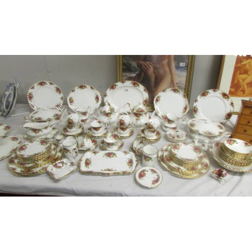 1446 - In excess of 90 piecesof Royal Albert Old Country Roses tea and dinner ware.  COLLECT ONLY.