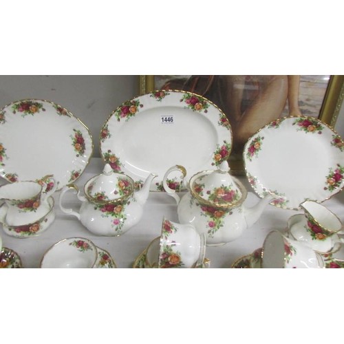 1446 - In excess of 90 piecesof Royal Albert Old Country Roses tea and dinner ware.  COLLECT ONLY.