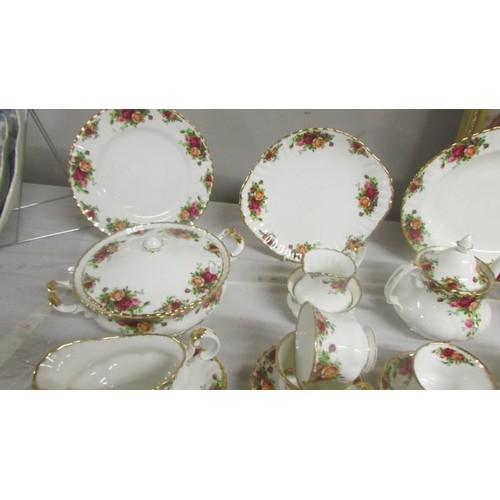 1446 - In excess of 90 piecesof Royal Albert Old Country Roses tea and dinner ware.  COLLECT ONLY.