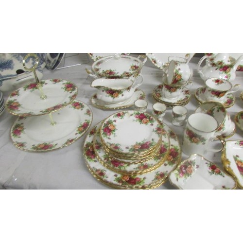 1446 - In excess of 90 piecesof Royal Albert Old Country Roses tea and dinner ware.  COLLECT ONLY.