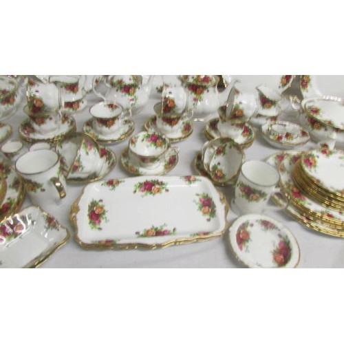 1446 - In excess of 90 piecesof Royal Albert Old Country Roses tea and dinner ware.  COLLECT ONLY.