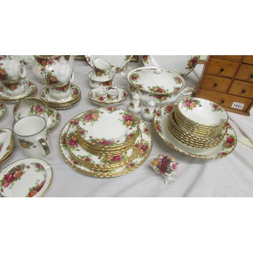 1446 - In excess of 90 piecesof Royal Albert Old Country Roses tea and dinner ware.  COLLECT ONLY.