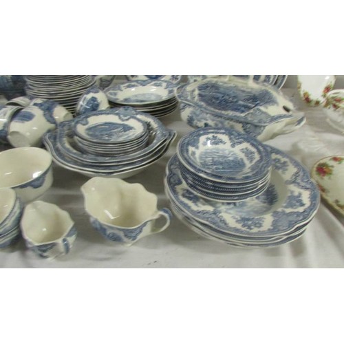 1447 - In excess of 200 pieces of Johnson Bros., blue and white tea and dinnerware including castle pattern... 