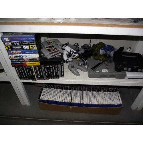 112 - Nintendo and PlayStation games console and large quantity of games. Collect Only