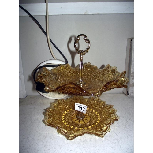 113 - A vintage amber glass 2 tier cake stand