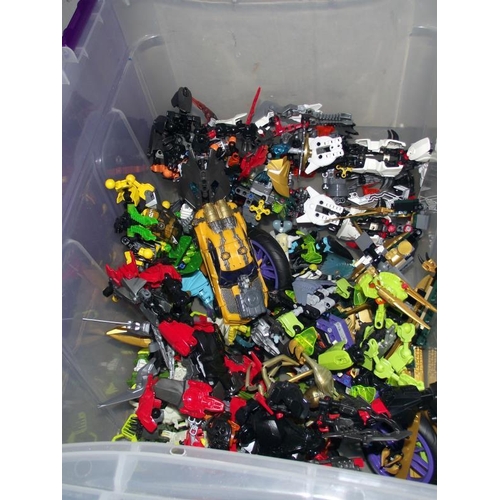 13 - 1 box containing Lego Bionicles and 1 containing Mergablocs, Halo etc