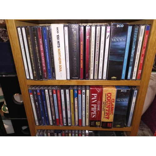 178 - A quantity of music CD's including Country, the 3 tenors etc. including CD storage case