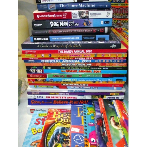 25 - A large selection of children's books/annuals including The Simpsons, Beano etc