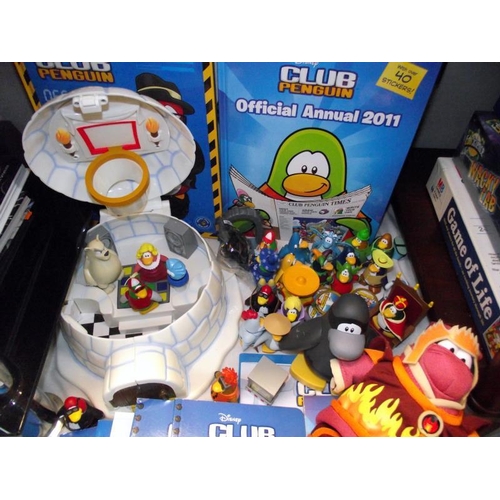 35 - A  good lot of Club Penguin figures, books, igloo and game by Disney