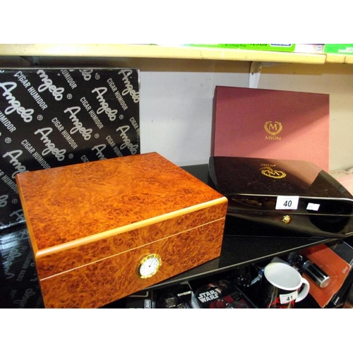 40 - An Angelo walnut cigar humidor and 1 other, both boxed and as new