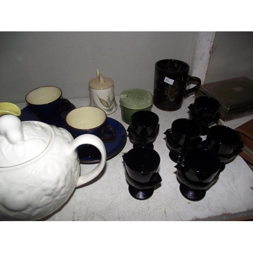 86 - Quantity of pottery including Sylvac tea caddy etc plus set of 6 black glass egg cups