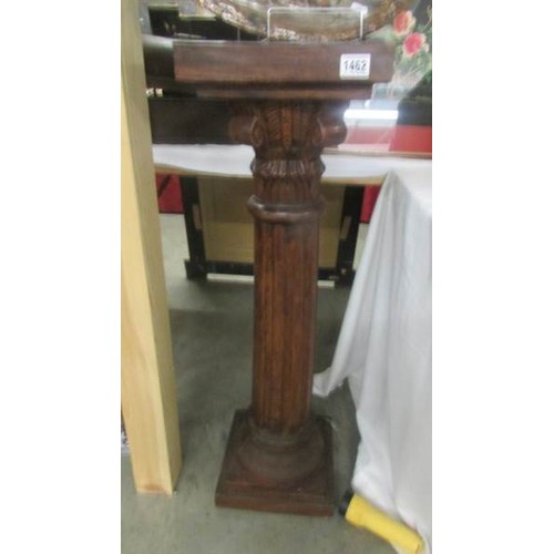 1462 - A mahogany Corinthian column torchere. COLLECT ONLY.