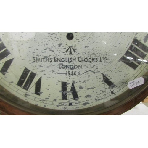 1477 - A circular wall clock marked Smith's English Clocks Ltd., London, 1944.