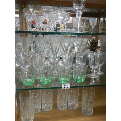 673 - Three shelves of drinking glasses. COLLECT ONLY.