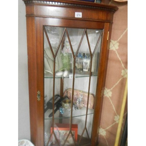 674 - A mahogany astragal glazed corner cabinet. COLLECT ONLY.