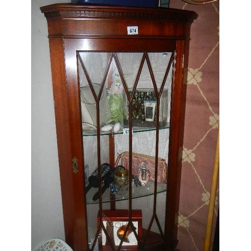 674 - A mahogany astragal glazed corner cabinet. COLLECT ONLY.