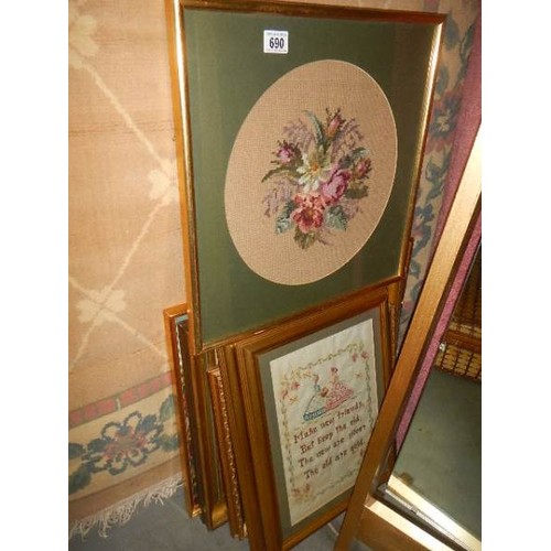 690 - A quantity of framed and glazed cross stitch pictures, COLLECT ONLY.