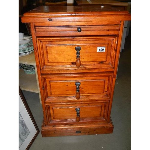 699 - A three drawer bedside chest, COLLECT ONLY.