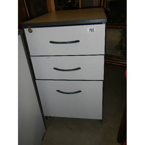 702 - A three drawer filing chest. COLLECT ONLY.