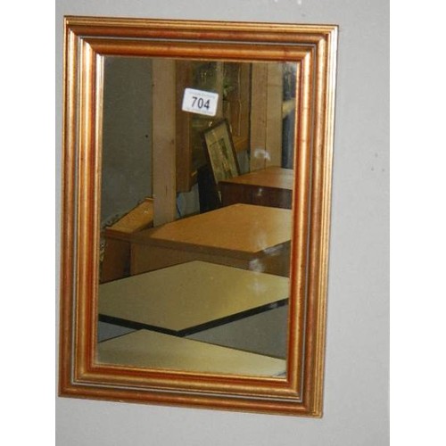 704 - A mahogany framed mirror, COLLECT ONLY.