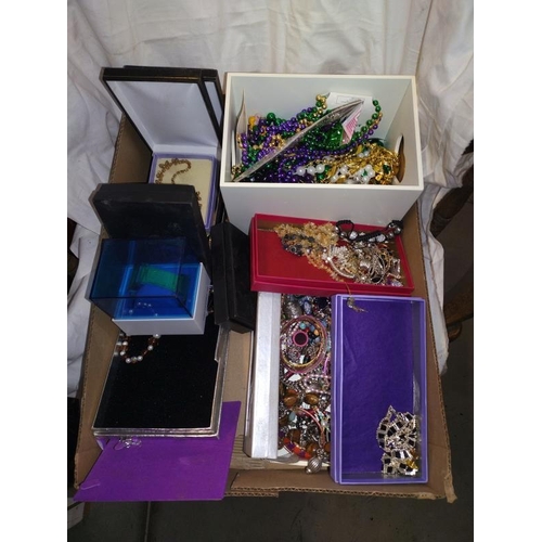 242 - A large box of assorted costume jewellery including silver