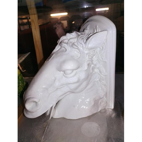 255 - A large white glazed pottery horses head wall bracket, top 16cm x 28.5cm, height 26cm