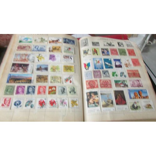 1491 - Four albums of world stamps.