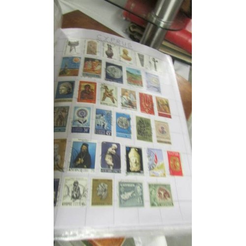 1491 - Four albums of world stamps.