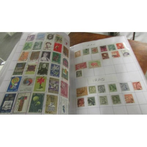 1491 - Four albums of world stamps.