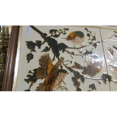 1494 - Two framed bird decorated tiles.