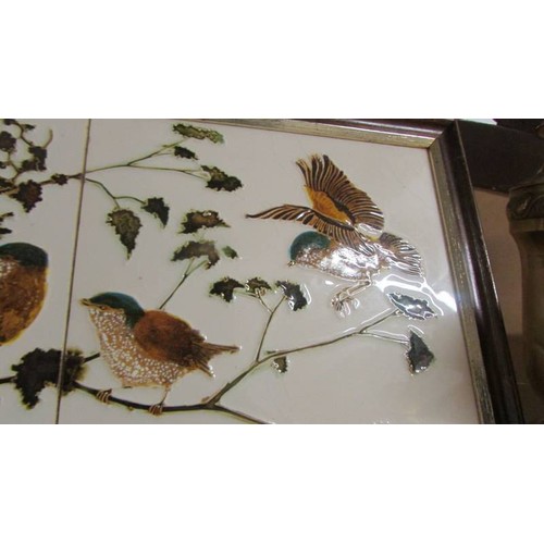 1494 - Two framed bird decorated tiles.