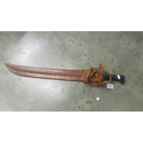 1503 - A machete in sheath. COLLECT ONLY.