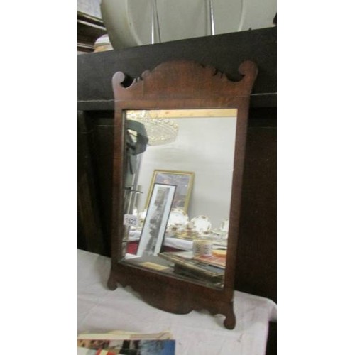 1523 - A mahogany framed mirror. COLLECT ONLY.