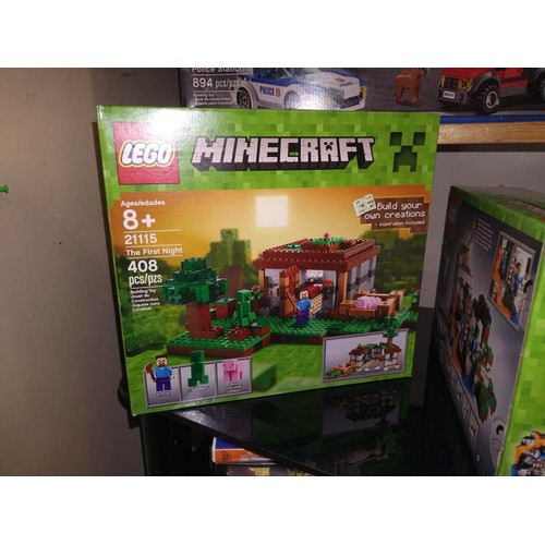 17 - 3 boxed sealed Lego Minecraft sets 21113, 21106 and 21115 and selection of Minecraft books etc