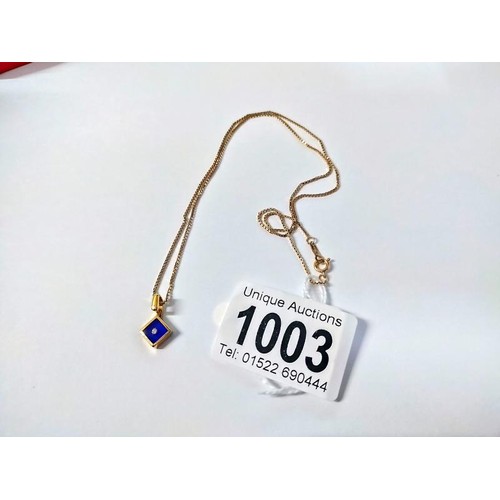 1003 - A 9ct gold pendant on 9ct gold chain, 2.6 grams. Length of chain 42cm