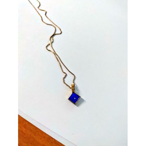 1003 - A 9ct gold pendant on 9ct gold chain, 2.6 grams. Length of chain 42cm