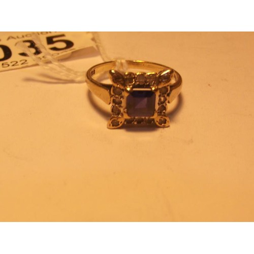 1035 - A square sapphire and diamond ring in yellow gold, size N half.