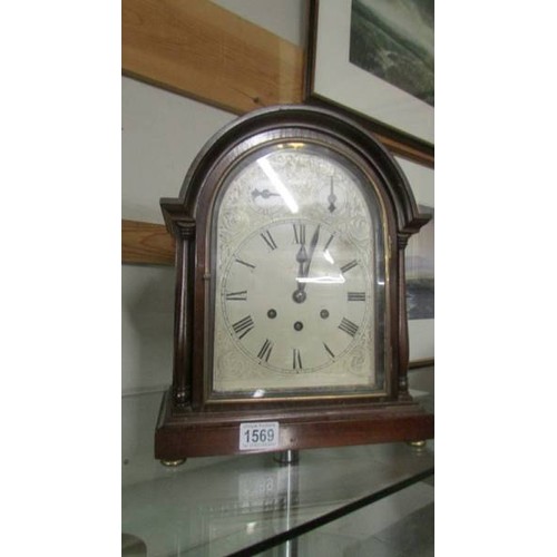 1569 - A mahogany bracket clock. COLLECT ONLY.