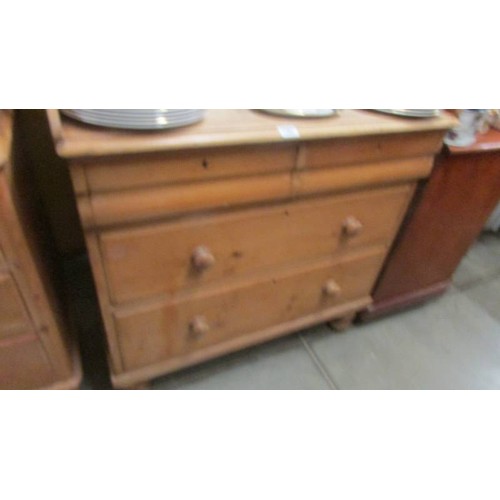 1587 - A Victorian pine chest of drawers with ornate splash back, 93 x 54 x 88cm high, back 112 cm. COLLECT... 