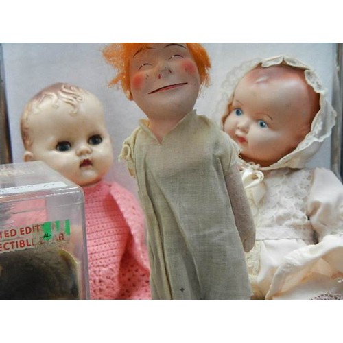 722 - A quantity of vintage dolls etc.,