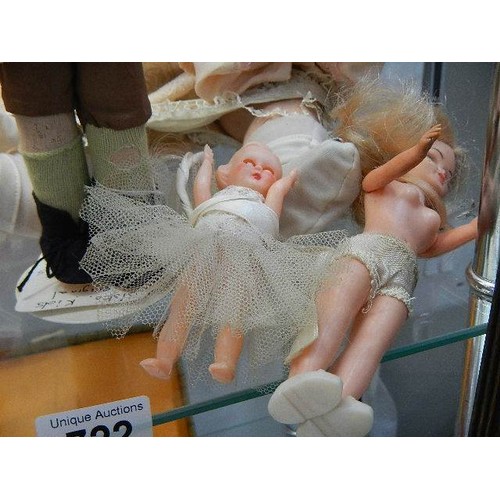 722 - A quantity of vintage dolls etc.,