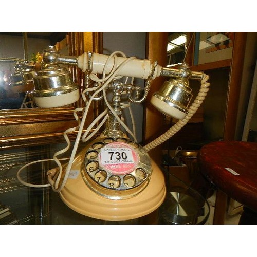 730 - A vintage style telephone.