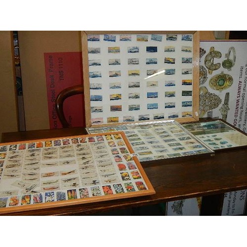 756 - Three framed and glazed cigarette/tea card displays and a classical locomotives coin card display. C... 