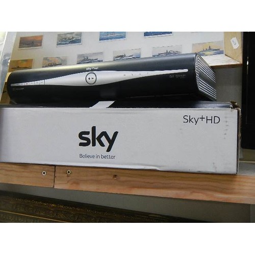 757 - A Sky box and two televisions. COLLECT ONLY.