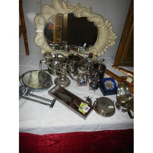 766 - A mixed lot of silver plate and a mirror. COLLECT ONLY.