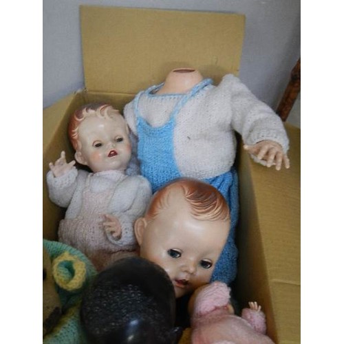 768 - Three vintage dolls and a vintage teddy bear.