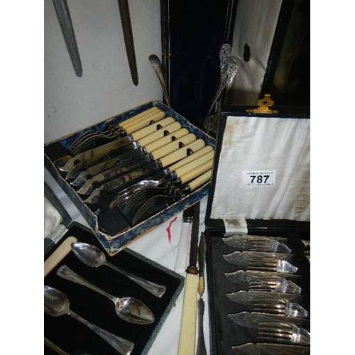 787 - A mixed lot of cased cutlery sets etc.,