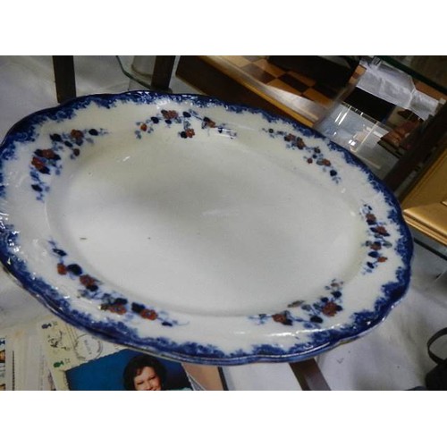 799 - A large studio pottery dish and a meat platter, COLLECT ONLY