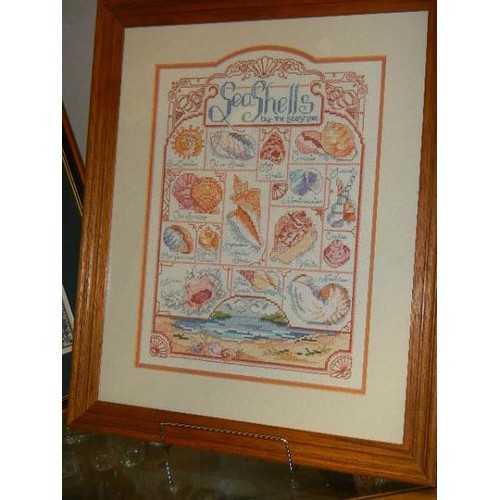 670 - Two framed and glazed cross stitch pictures.  COLLECT ONLY.