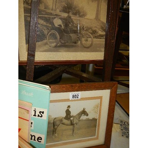 802 - Two framed and glazed prints of a motorcyclist and a hunter on horse. COLLECT ONLY.